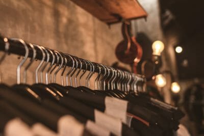 photo-of-black-clothes-on-hangers-1036856-400x267
